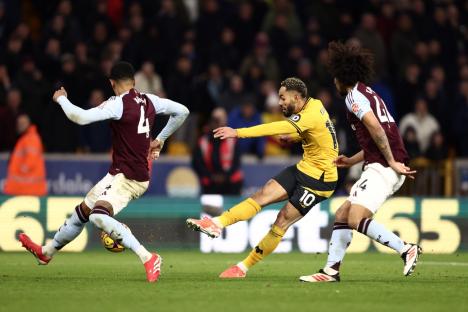 WOLVERHAMPTON, ENGLAND - FEBRUARY 01: Matheus Cunha of Wolverhampton Wanderers scores his team's second goal during the Premier League match between Wolverhampton Wanderers FC and Aston Villa FC at Molineux on February 01, 2025 in Wolverhampton, England. (Photo by Jack Thomas - WWFC/Wolves via Getty Images)