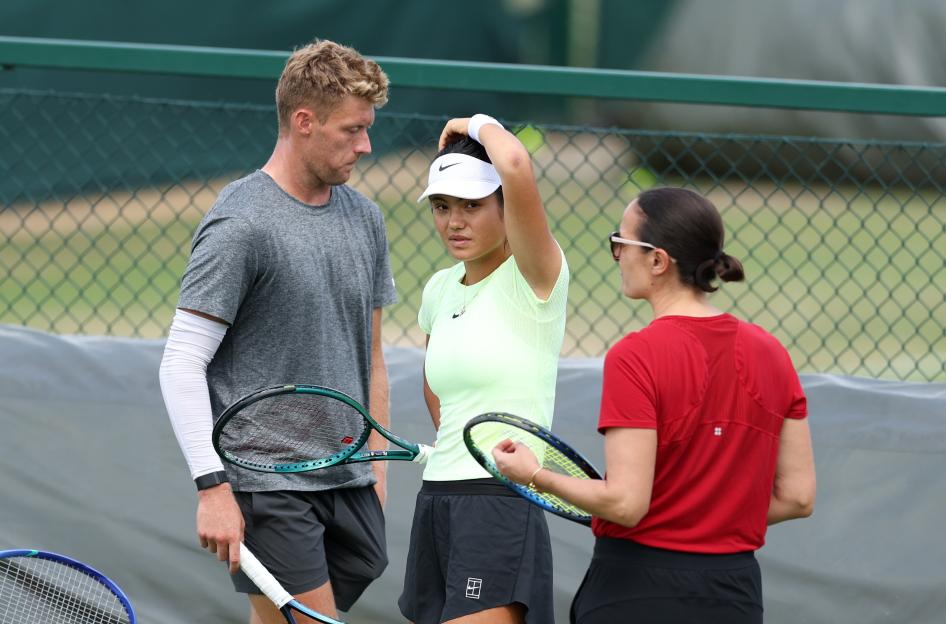 Emma Raducanu of Great Britain with her team during a practice session.