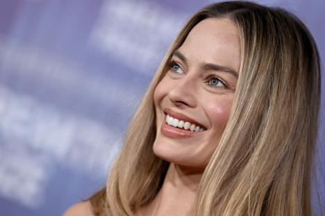Margot Robbie smiling at the Breakthrough Prize Ceremony.