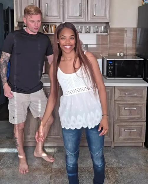 Couple in kitchen, six years after age-gap relationship began.