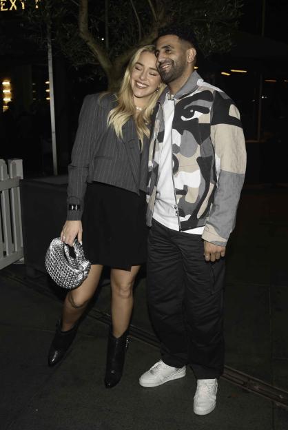 Riyad Mahrez and Taylor Ward leaving a restaurant.