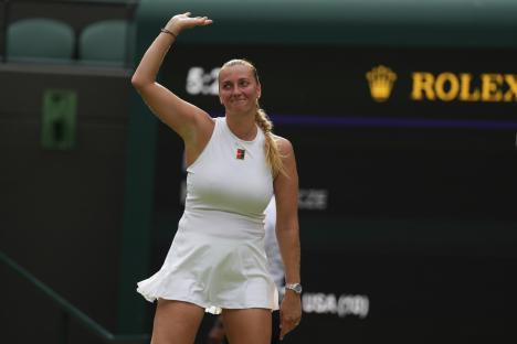 Petra Kvitova of Czech Republic waves to the crowd after her first round women's single match against Emma Navarro of the U.S. at the Wimbledon Tennis Championships in London, Tuesday, July 1, 2025.(AP Photo/Kirsty Wigglesworth)