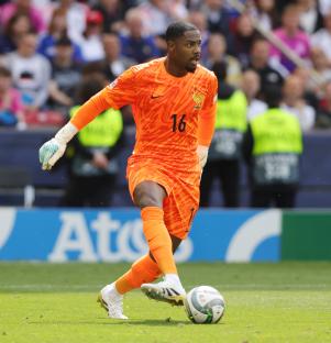 Mike Maignan, AC Milan goalkeeper, on the field.