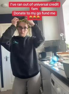 Screenshot of a TikTok video showing a woman asking for donations for a boob job.