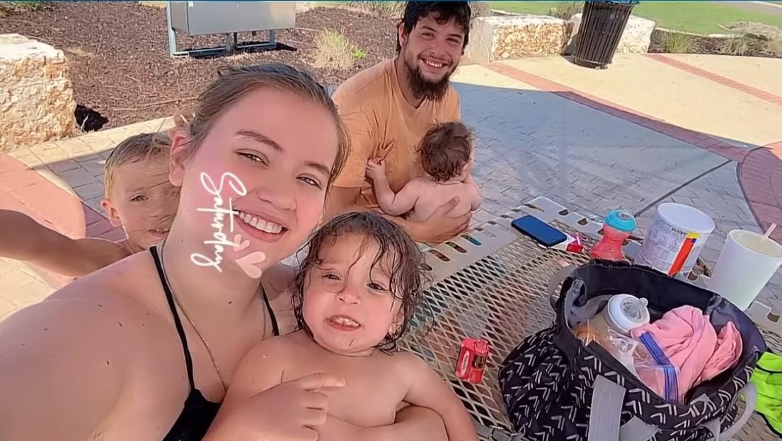 Photo of a family at a park.
