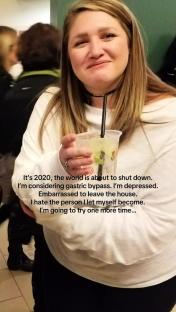 Woman holding a drink, reflecting on her weight and mental health.