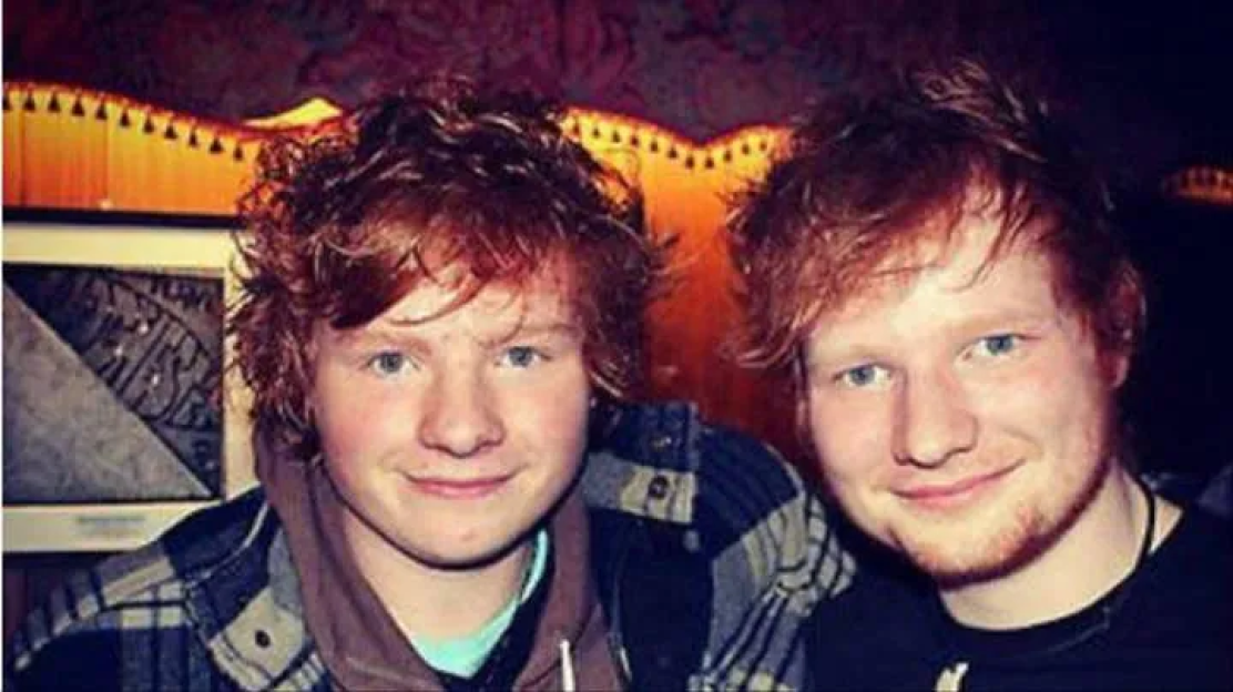 Two young men with red hair.