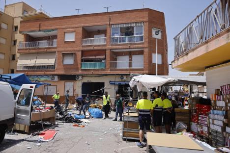 Emergency responders at the scene of a bar explosion in San Pedro del Pinatar, Murcia, Spain.