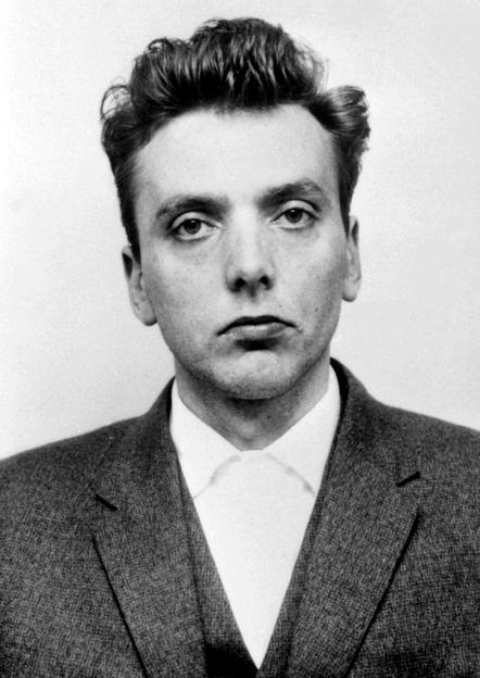 Black and white mugshot of Ian Brady.