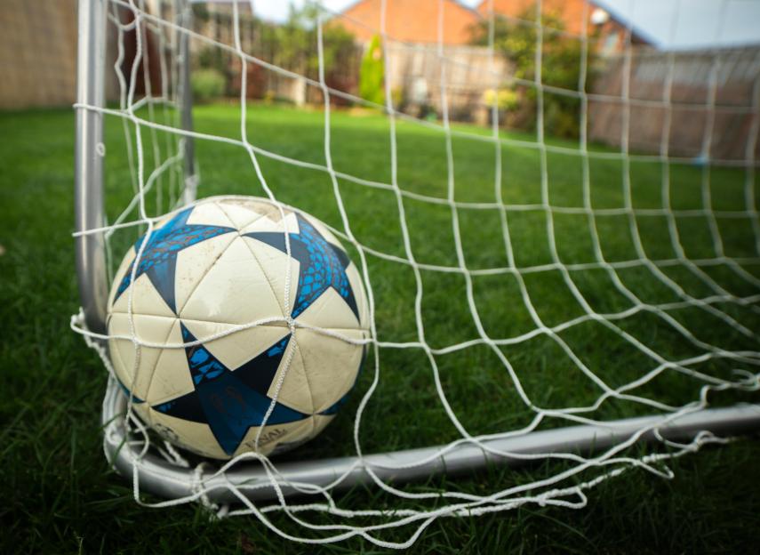 Soccer ball in net.