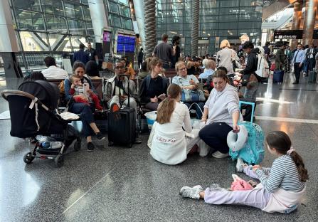 Passengers sitting in Hamad International Airport.