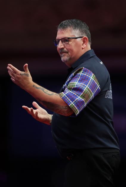 Gary Anderson of Scotland reacting during a darts match.