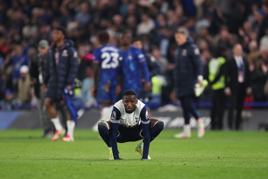 Pape Matar Sarr of Tottenham Hotspur looking dejected after a soccer match.
