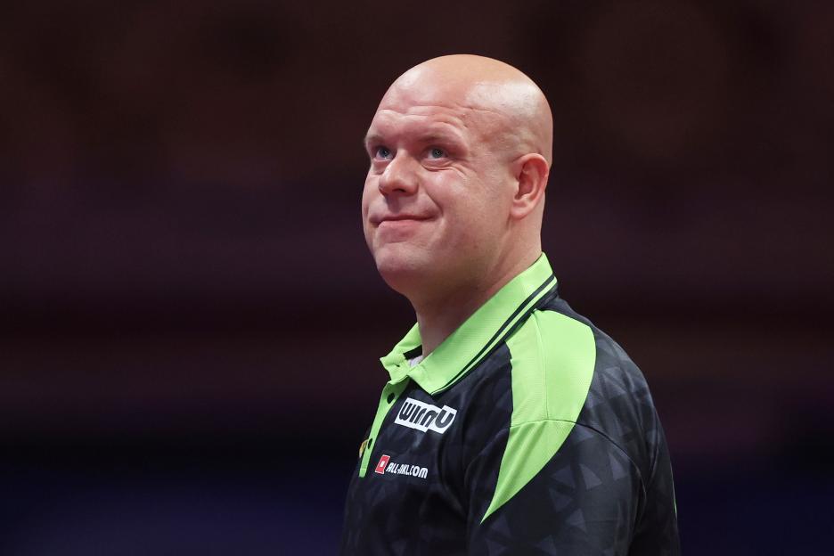 Michael van Gerwen of the Netherlands reacting during a darts match.