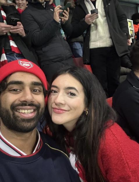 Couple at a football match.