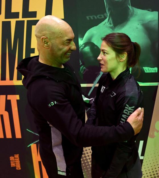 Katie Taylor and her father after weigh-ins.