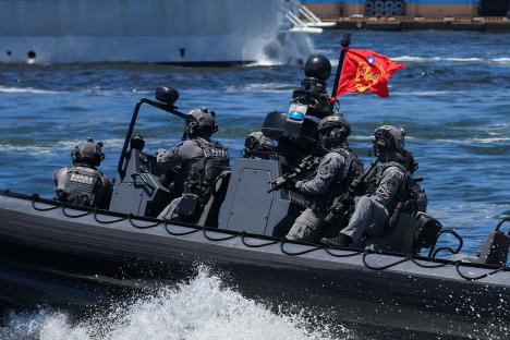 Taiwan Coast Guard Special Task Unit members in a speedboat during a joint-forces exercise.