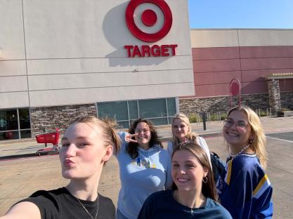 Selfie of four girls in front of a Target store.
