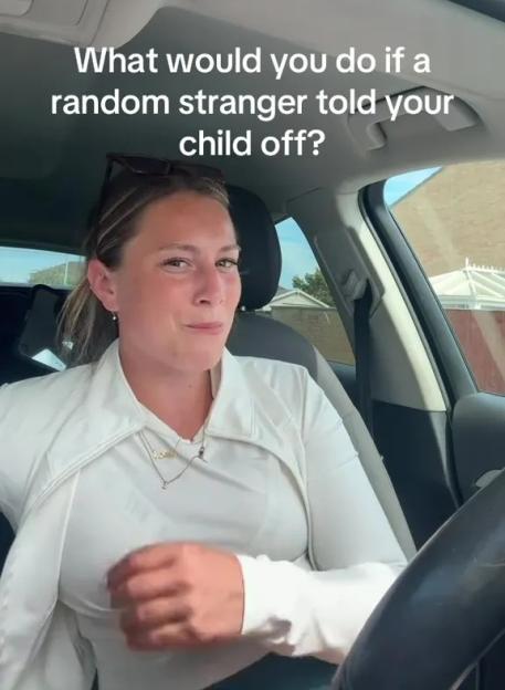 Woman in a car asking what people would do if a stranger told their child off.
