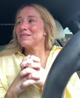 Alex Murphy crying in a car, discussing her fertility journey.