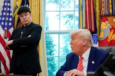 Elon Musk and Donald Trump at a press conference in the Oval Office.