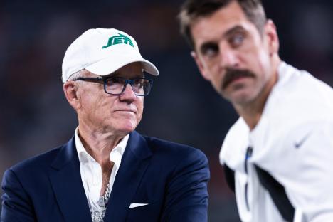 New York Jets owner Woody Johnson and Aaron Rodgers before a game.
