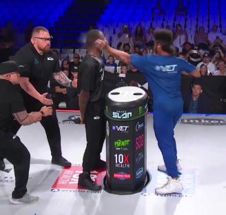 Ronda Rousey delivering a power slap.
