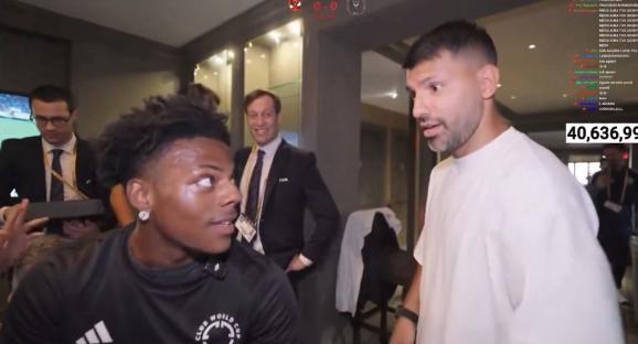 Sergio Aguero in conversation with another man at the Club World Cup.