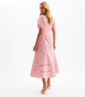 Model wearing a pink floral midi dress with puff sleeves.