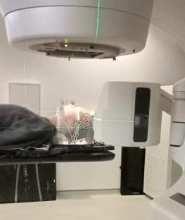 A patient undergoing radiotherapy treatment.