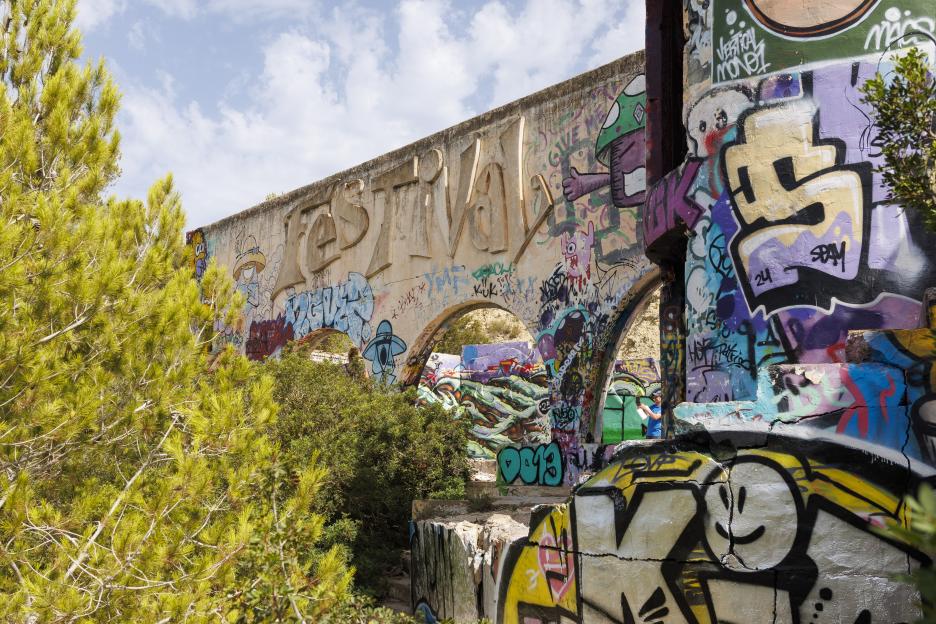Graffiti-covered ruins of the Festival Club in Ibiza.