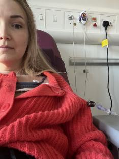 Woman receiving cancer treatment in a hospital.