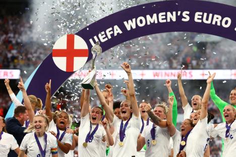 England's women's soccer team celebrates winning the UEFA Women's Euro 2022.