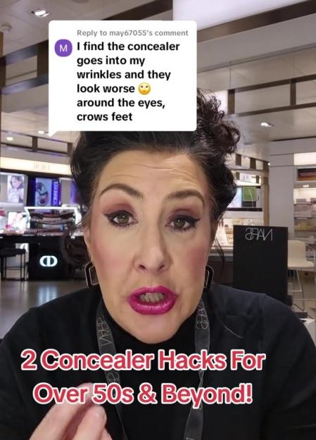 Woman demonstrating concealer application techniques for older skin.