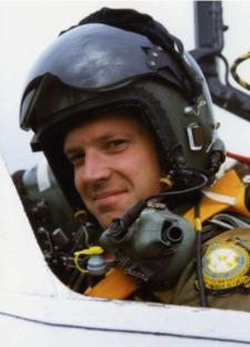 Close-up of a pilot in a cockpit.