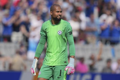 Robert Sanchez, Chelsea goalkeeper, smiles.