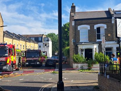 Emergency services at the scene of a suspected gas explosion.
