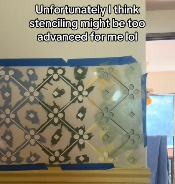 Wall with incomplete stencil pattern.