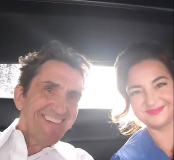 Selfie of a man and woman in a car.