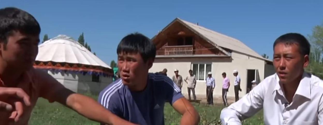 Three Kyrgyz men discussing bride kidnapping.