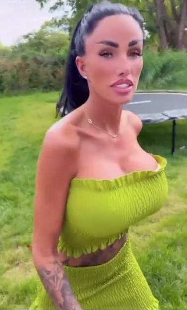 Katie Price in a lime green two-piece outfit in a garden.