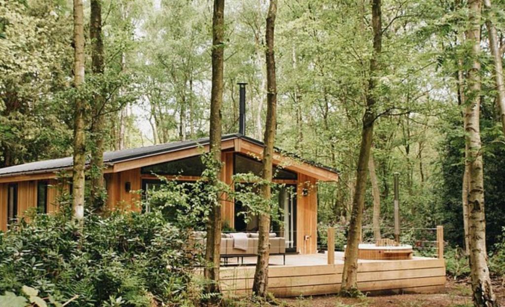 Luxury lodge nestled in a wooded area.