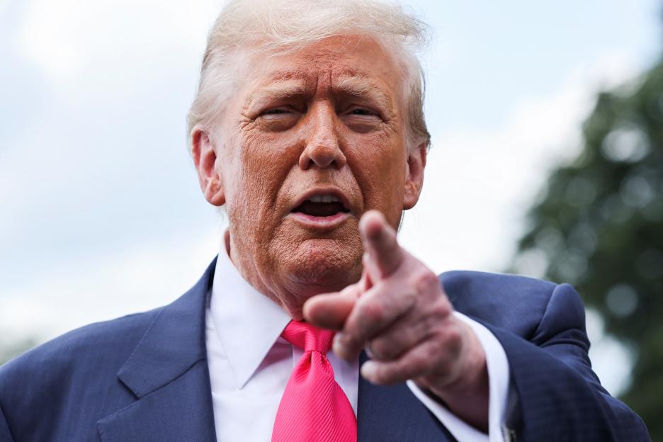 Donald Trump pointing at the camera.