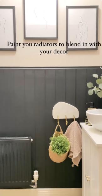 Painted radiator blending with decor in a bathroom.