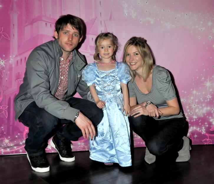 Lisa Faulkner, Chris Coghill, and their daughter at a Disney On Ice event.