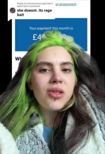 Screenshot of a TikTok video showing a young woman with green hair asking for donations for a boob job.
