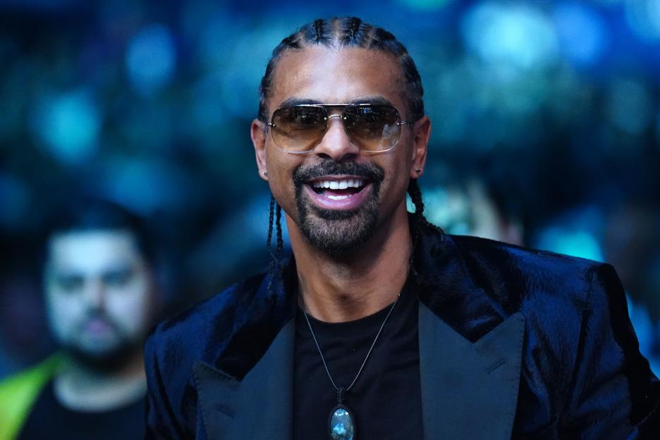 David Haye, former British boxer, smiling and wearing sunglasses.