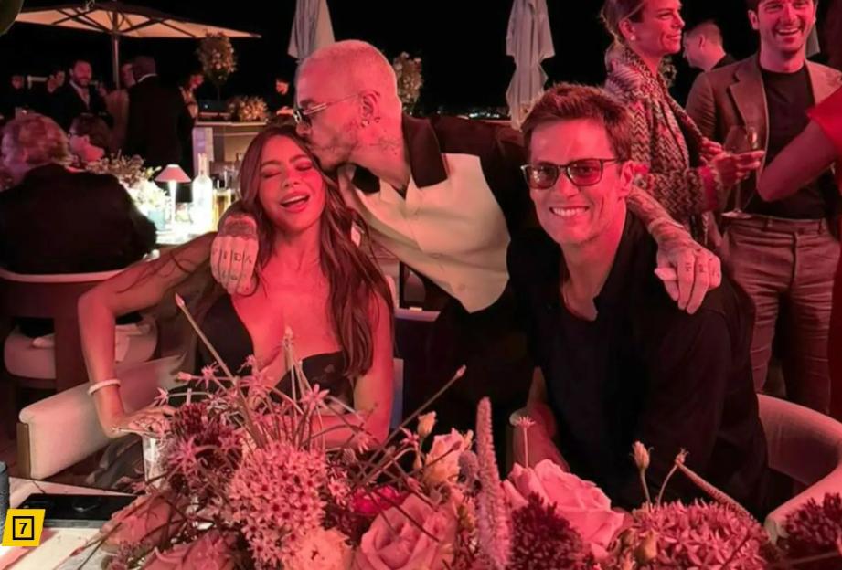 Tom Brady with Sofia Vergara and another man at a dinner party.