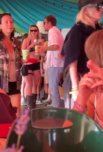 People socializing at an outdoor event.