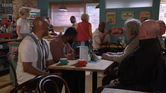 People sitting in a cafe.